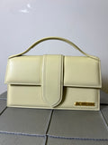 Jacquemus la grand bambino giallo paglino